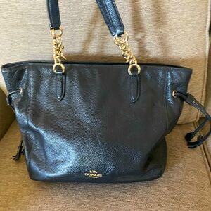 Large Black Coach leather purse with gold hardware.